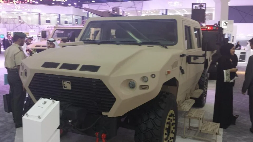 A NIMR AJBAN armored 4x4 displayed indoors