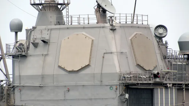 Octagonal AN/SPY-1 phased-array radar faces on the superstructure of cruiser USS Antietam (CG 54)