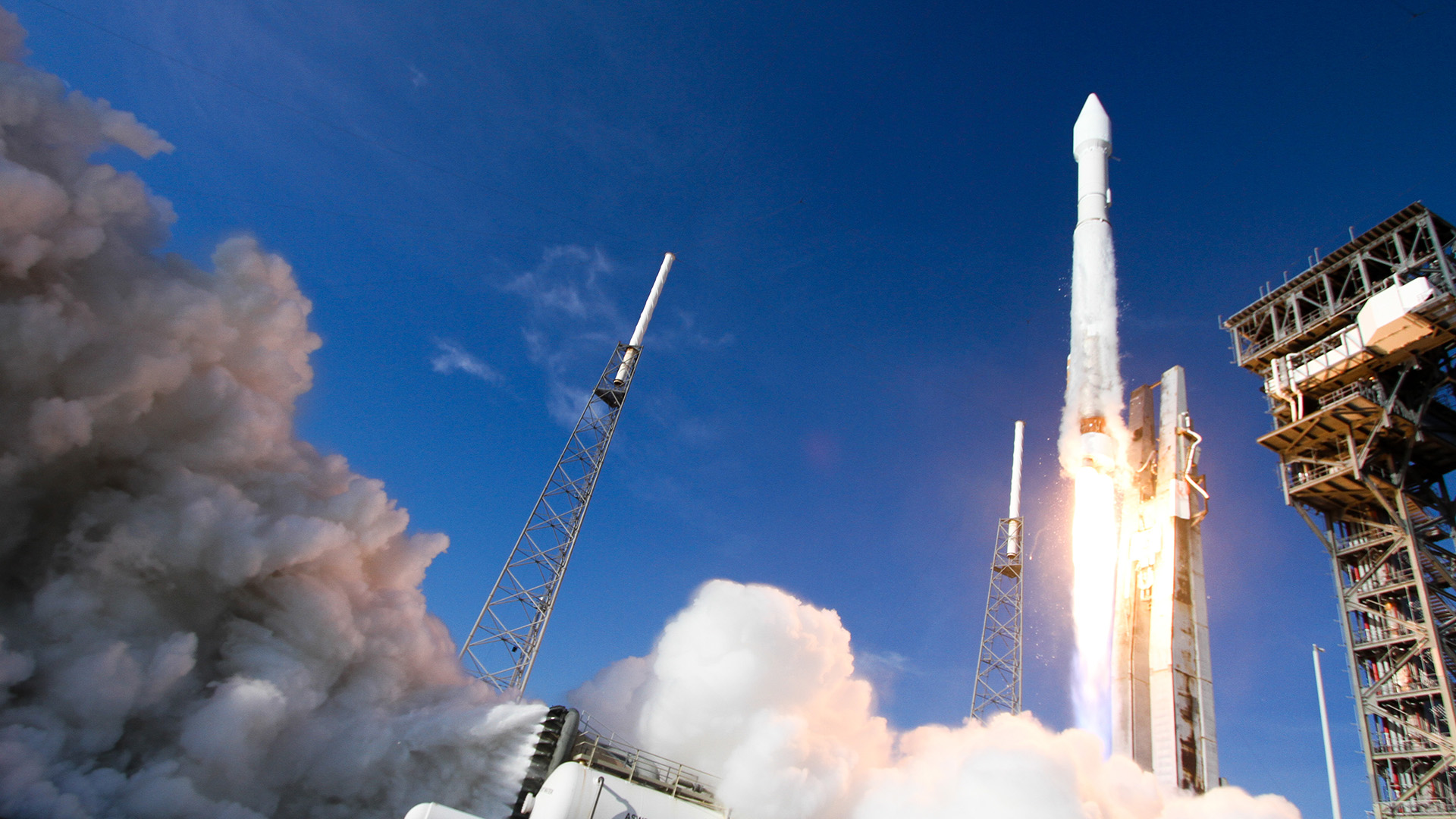 A United Launch Alliance Atlas V rocket lifting off from its launch pad