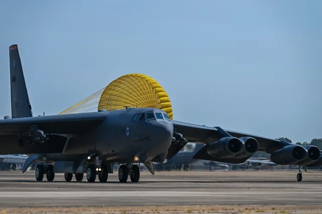 A B-52H Stratofortress lands at Barksdale Air Force Base with its drag parachute deployed.