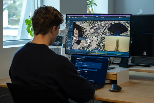 Blueye Cloud map interface displayed on a monitor and laptop.