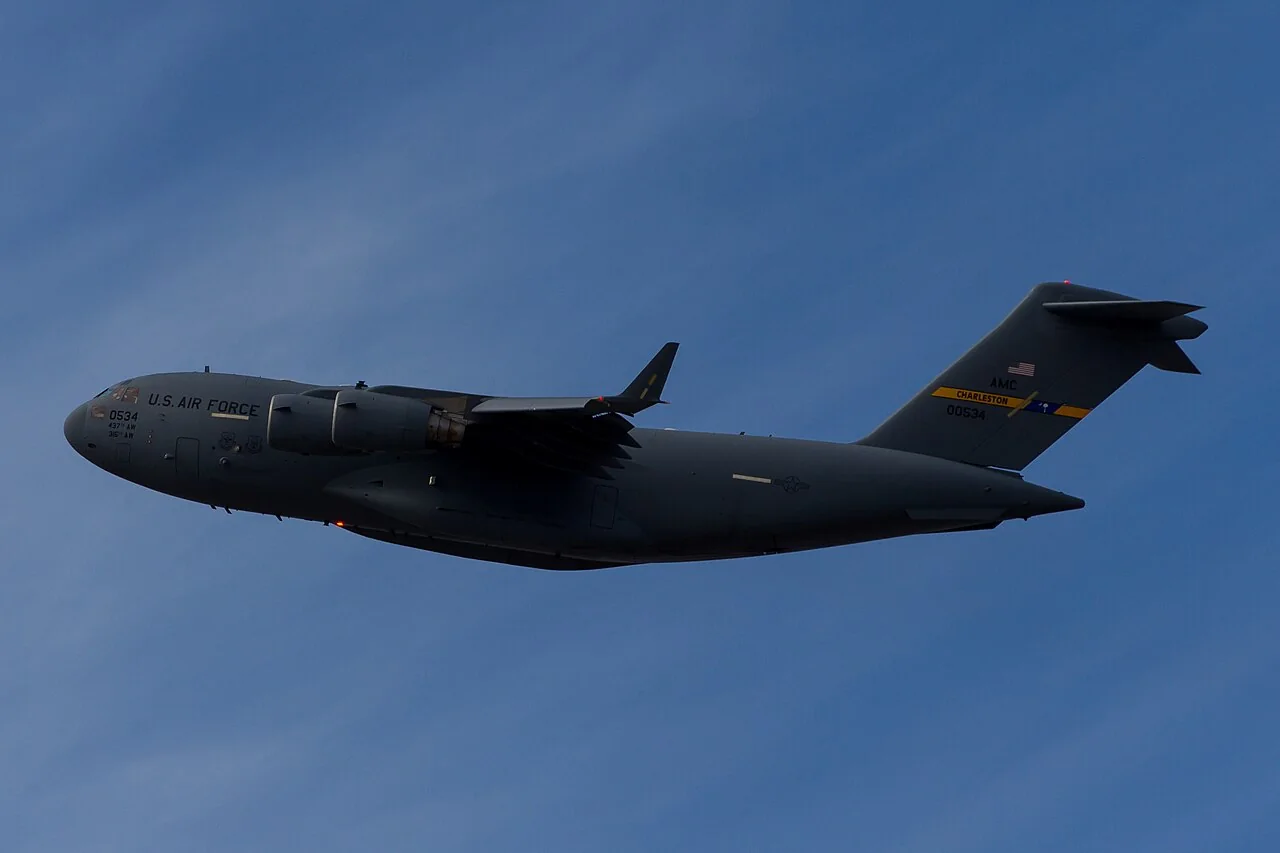 A C-17 Globemaster III in flight over Dover Air Force Base