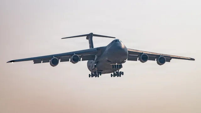 A C-5M Super Galaxy approaching to land with landing gear extended
