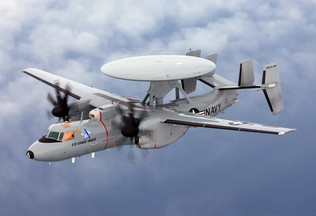 Two E-2D Advanced Hawkeye aircraft conducting a test flight in December 2009.