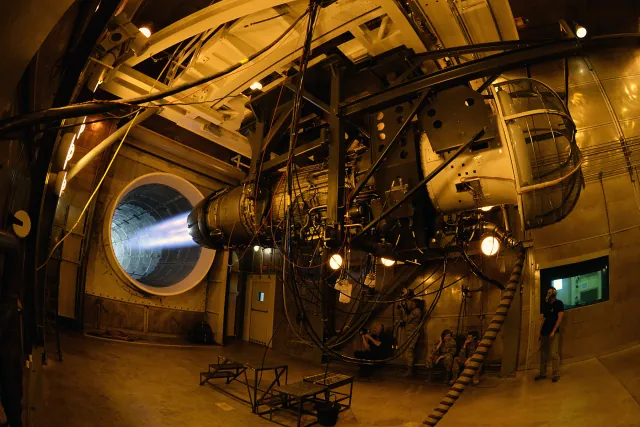 A General Electric F110 engine running at maximum power in a hush-house test facility at Hill Air Force Base
