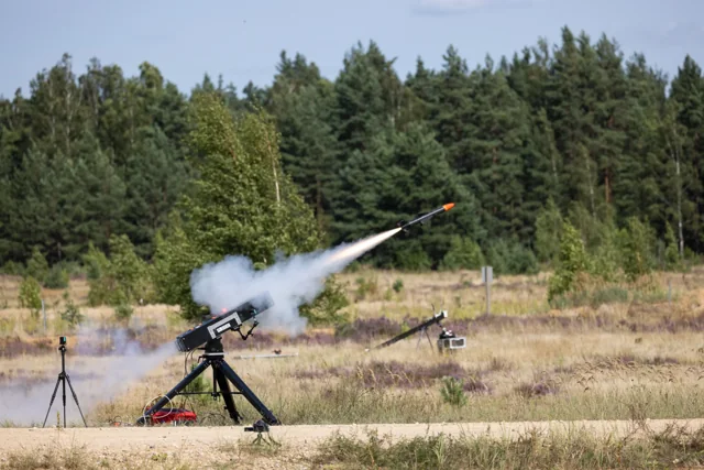 A Frankenburg Mark I interceptor missile leaving its launcher during a field test