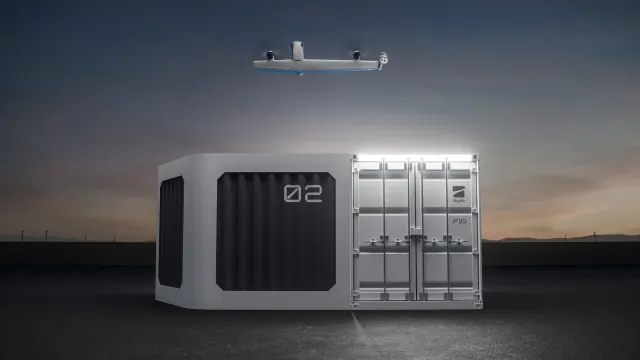 Company rendering of the Skydio F10 Lightrunner above its container-sized MegaDock.