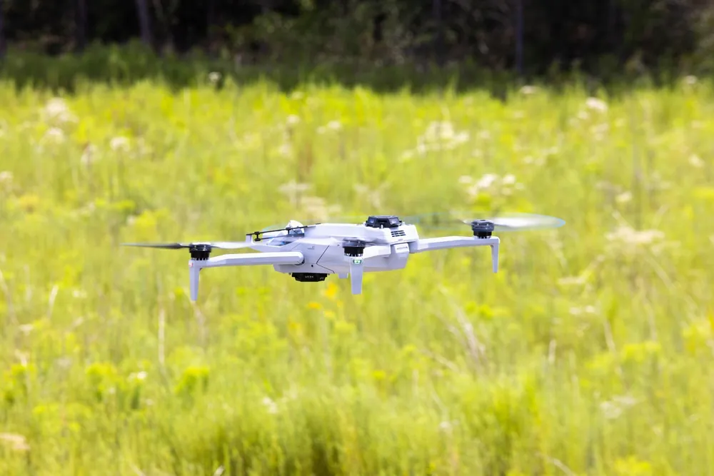 Skydio X10D quadcopter flying above grass during training at Townsend Bombing Range.