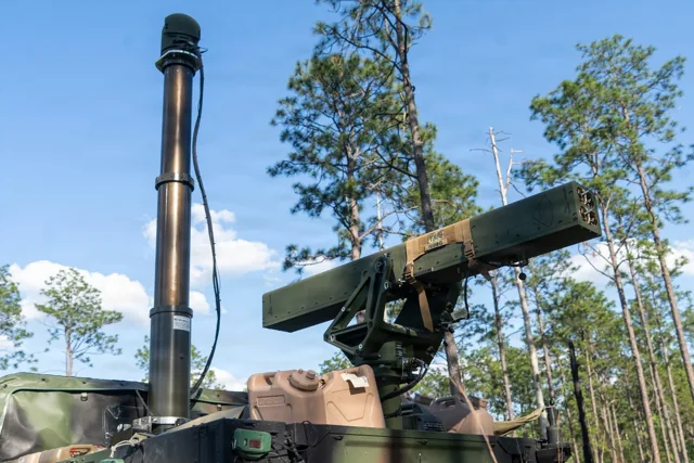 A VAMPIRE counter-drone rocket launcher and sensor mast positioned for field operations.