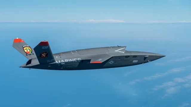 A U.S. Marine Corps XQ-58A Valkyrie experimental aircraft in flight